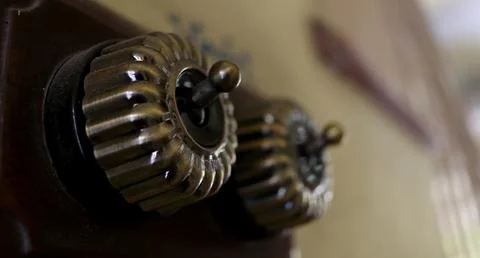 Retro switch on wall. Stock Photos