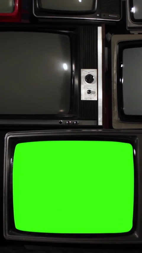 Retro Television Stack, Bottom Screen Blinking Green Screen, Zoom In Stock Footage 328130170