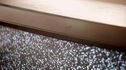 Retro television static and flicker, extreme close up, pull focus Stock Footage 124937887
