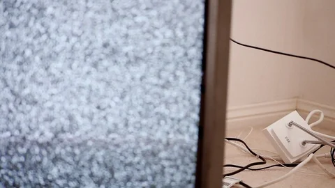 Retro television static with cables behind, pull focus Stock Footage 124937883