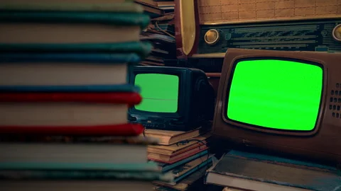 Retro Televisions Green Screen Stack of Books Panning Shot Old TV Stock-Footage 251721181