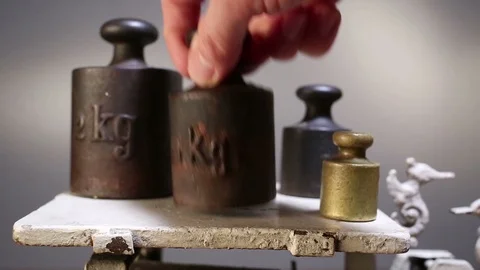 Retro trading scale with different sizes weights. Stock Footage 86141569