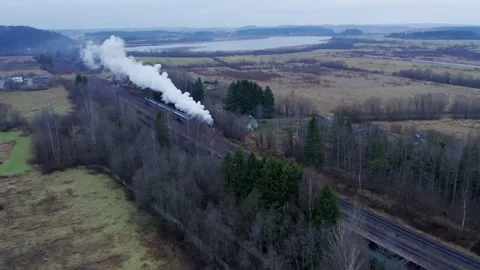 Retro train ruskeala-express on a turning circle in the mountain park Ruskeala Stock Footage 172047863