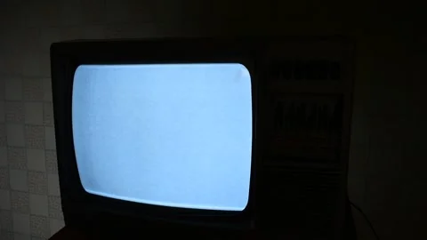 Retro TV with a flickering screen, side view Stock Footage 138399882
