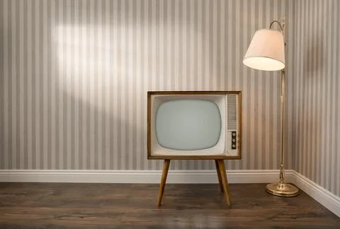 Retro TV set in empty room Stock Photos