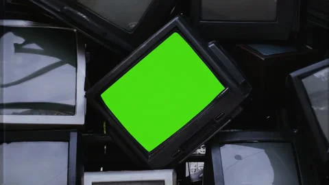Retro TV Stack Green Screen Vintage Television Zoom In Pile of Monitors Stock Footage 257464336