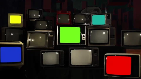 Retro TV Stack Turning Off Except Green Screen Zoom Out - 4K Stock Footage 276381323