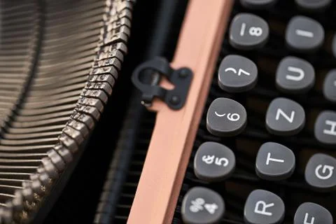 Retro typewriter in studio. Macro close up. Stock Photos