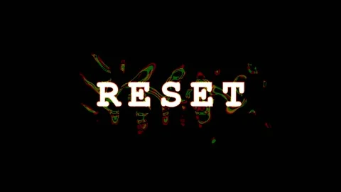 Retro typewriter text RESET with subtle fire animation on black background Stock Footage 344037189