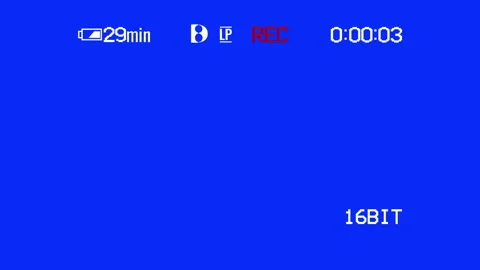 Retro VHS camcorder interface overlay with timecode on blue screen Video stock 335029362