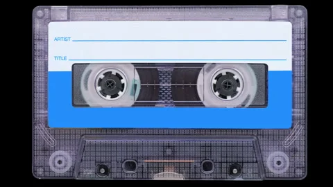 Retro VHS cassette with blank labels and exposed tape reels for archiving Stock Footage 344996325