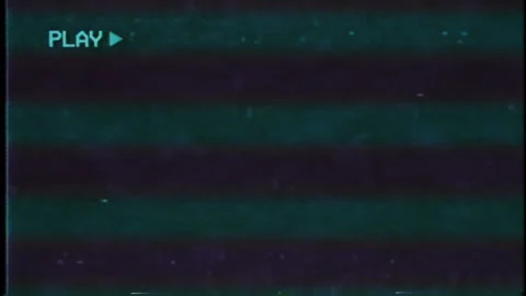 Retro VHS Tape Playback with "PLAY" Text, Analog Glitches, and Color Distortion 스톡 동영상 309692437