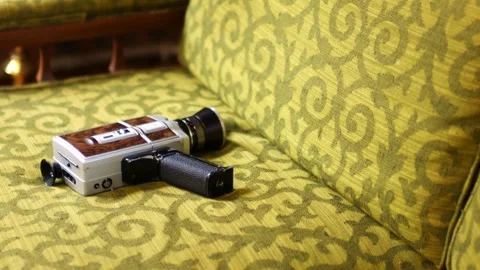 Retro Video Camera on 1970's Couch Vibe Stock Footage 242294855