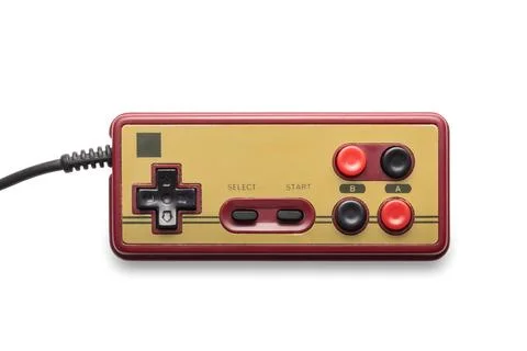 Retro Video Game Controller With Classic Design on White Background Stock Photos