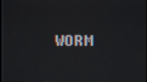 Retro videogame WORM word text computer tv glitch interference noise screen Video stock 90600577