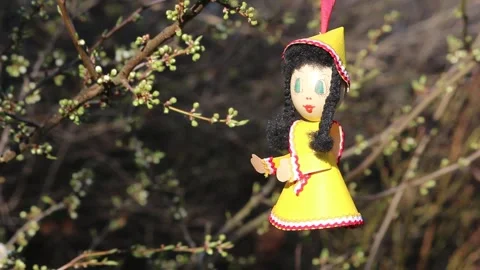 Retro vintage 70s Easter decoration hanging on tree, Easter egg doll Stockbeeldmateriaal 305932192