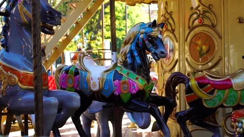 Retro vintage colorful circus carousel animal merry go round horse ride spinning Stock Footage 97295553
