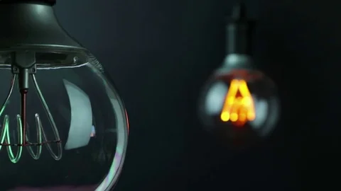 Retro vintage light bulb with blinking effect and led technology built-in Stock-Footage 77346108