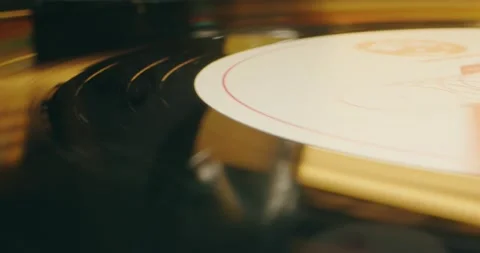 Retro Vinyl record player playing music, close-up macro shot of vintage LP disc Stock Footage 236475491