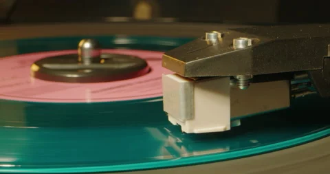 Retro Vinyl record player playing music, close-up macro shot of vintage LP disc Stock Footage 236475753