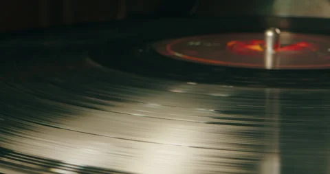 Retro Vinyl record player playing music, close-up macro shot of vintage LP disc Stock Footage 240349045