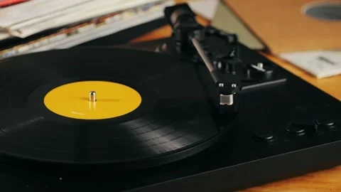Retro Vinyl record player playing music, close-up macro shot of vintage LP disc Stock Footage 273587701