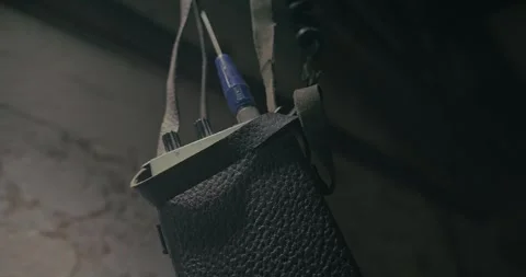 Retro Walkie Talkie Hanging Inside Low Lit Wartime Command Bunker Stock Footage 344348115