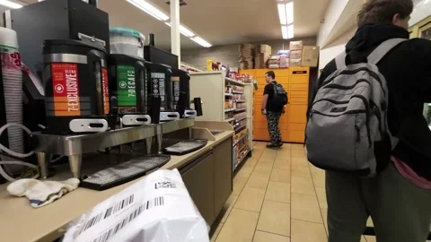 Return Amazon package in a store Amazon locker Stock Footage 229491534