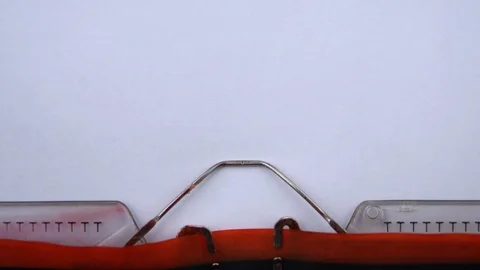 Return to base - phrase printed on an old typewriter in red letters, close up. Stock Footage 126776710