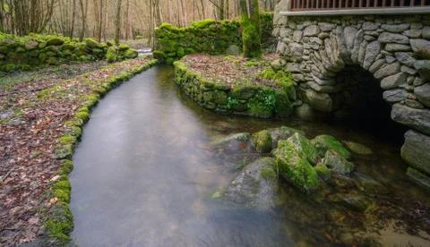 Return Canal of an Old River Stone Mill Stock Photos