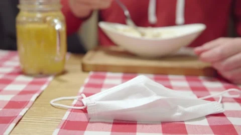 Return to normal life after lockdown: focus on the medical protective mask lying Stock Footage 162501787