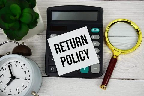 Return Policy text message with calculate, alarm clock and magnifying glass.. Stock Photos