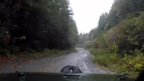 Return trip through flooded dirt road Stock Footage 172560962