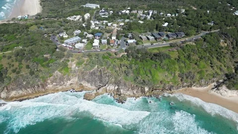 Returning to a cliff side sleepy town along the ocean Stock Footage 281144989