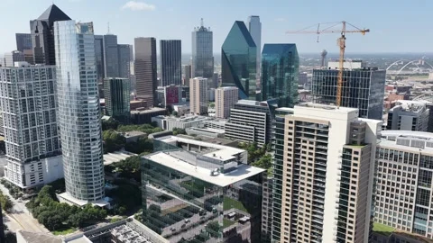 Reunion Tower and the Margaret McDermott Bridge across the Dallas skyline aerial Stock Footage 342480901