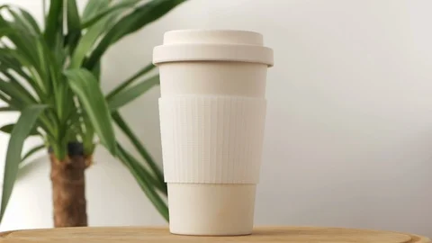 Reusable bamboo coffee cup rotating Video stock 115367166