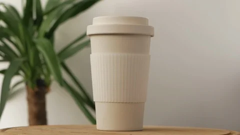 Reusable bamboo coffee cup rotating Stock Footage 115368025