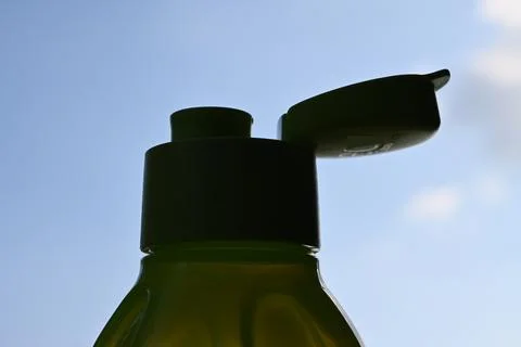 Reusable drinking bottle against sky Stock Photos