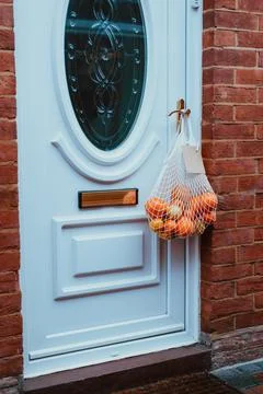 Reusable string bag from environmentally friendly materials with citrus fruits Stock Photos