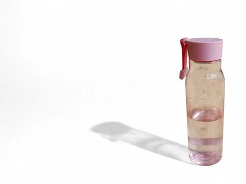 Reusable Water Bottle Casting Shadow on White Background with Copy Space Stock Photos