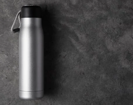 Reusable water bottle on a concrete background Stock Photos
