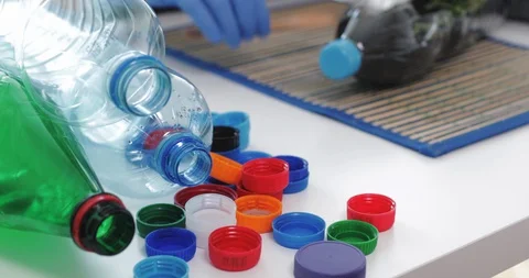 Reuse plastic bottle to seeding plant. Recycling plastic concept. Stock Footage 129785429