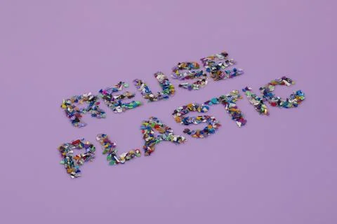 Reuse plastic text consisting of small recycled plastic pellets 스톡 사진