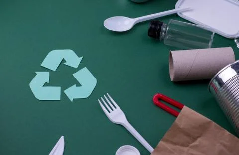 Reuse reduce recycle flat lay concept with plastic, paper, and polyethylene w Stock Photos
