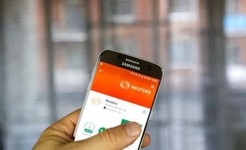 Reuters app on android phone. Stock Photos