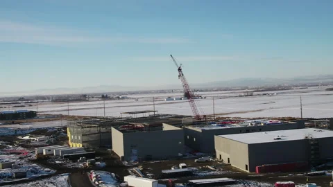 Reveal aerial of a crane on a construction project Stock Footage 284967230
