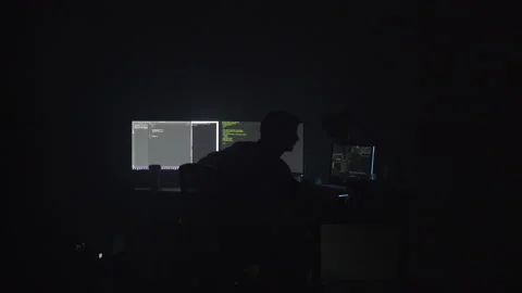 Reveal of a Coder in a Dark Room Stock Footage 208746192
