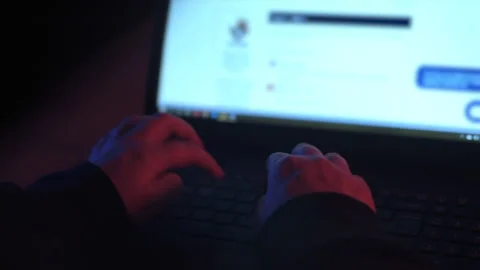 Reveal Female Hacker Using Laptop Over the Shoulder 5.1 Stock Footage 154263107