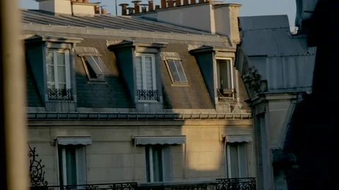 Reveal of the rooftops in Paris with a nice sunset light Stock Footage 274260316