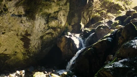 Reveal shot of River Flowing down the Cave With Water Drops. Stock Footage 142968262